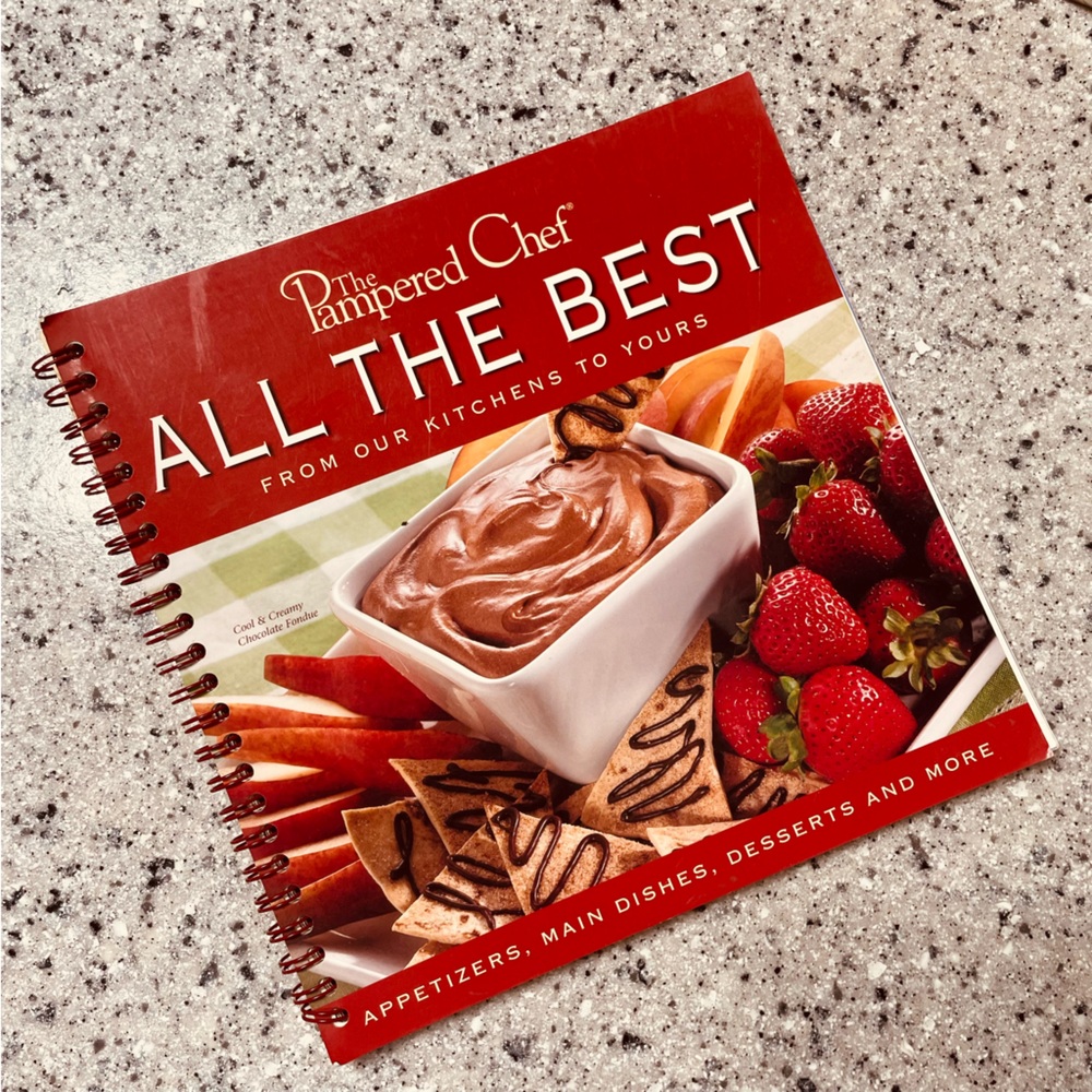 “All the Best” Pampered chef spiral bound cookbook.